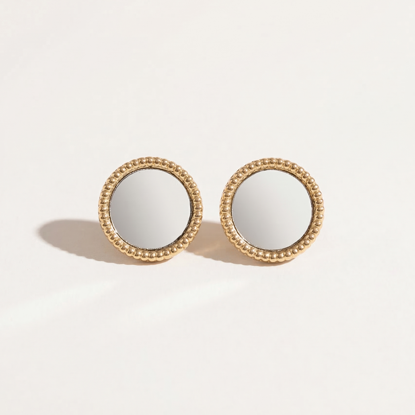 Gold studs with mirror effect silver plating