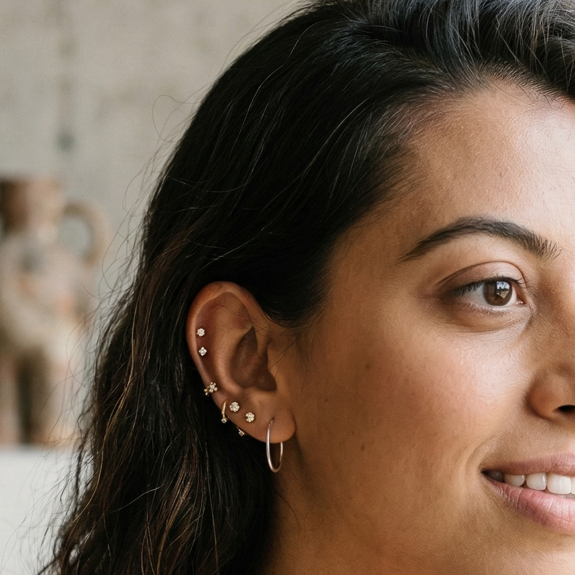 Woman wearing 20mm silver hoops