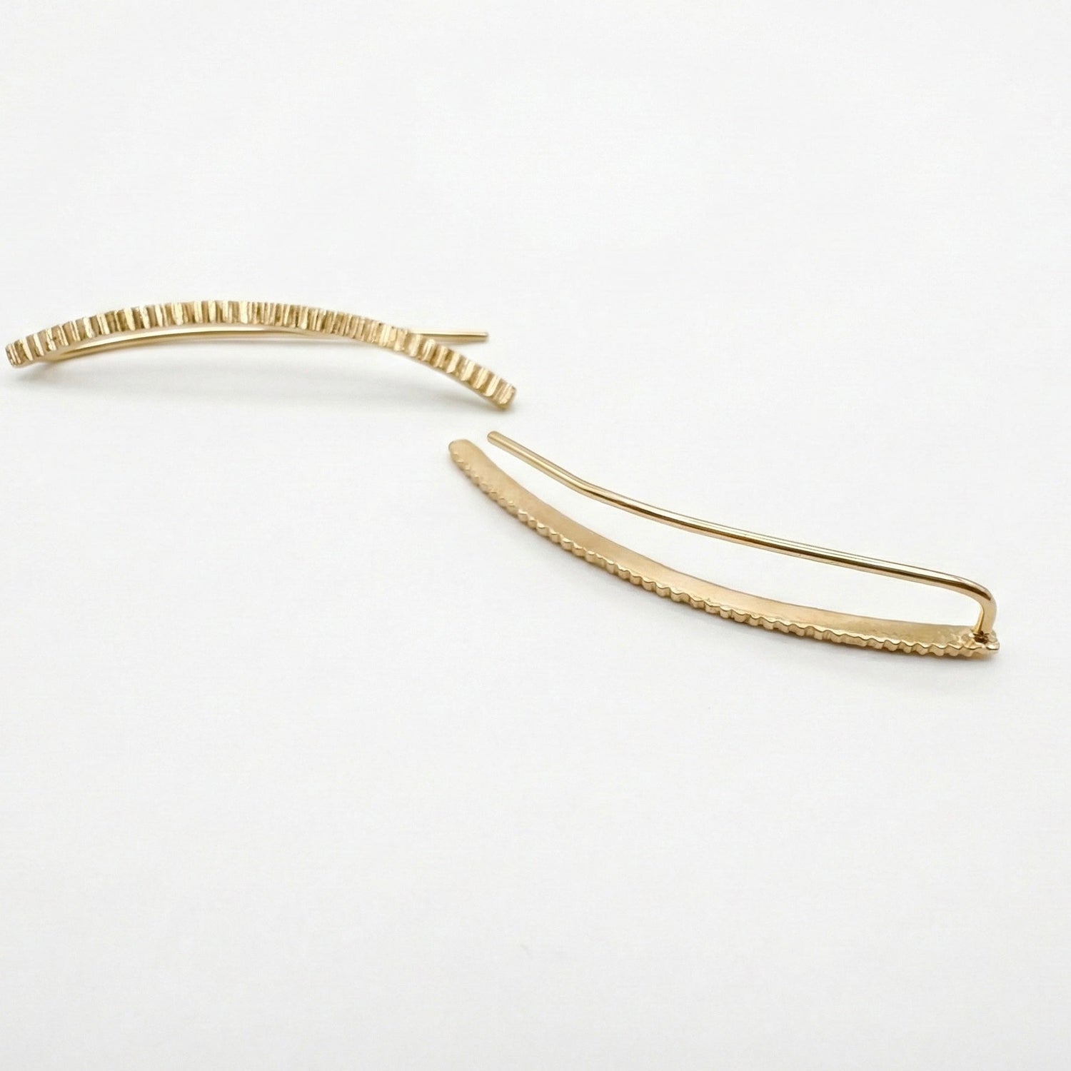 Ear climbers on a white background