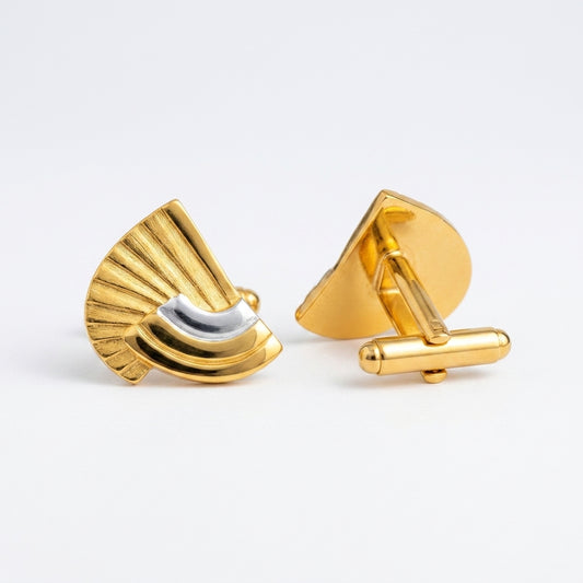 A pair of gold cufflinks shaped like stylized fan or scallop motifs, one shown from the front and the other from the side/back, on a clean white background.