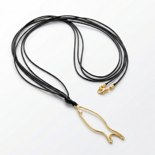 Black cord necklace with a gold fish-shaped pendant on a white background