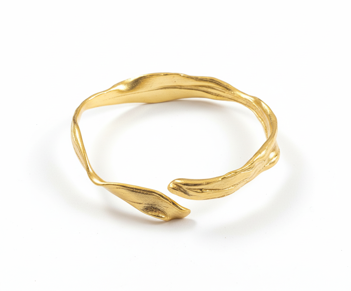 Gold bracelet on a white background
