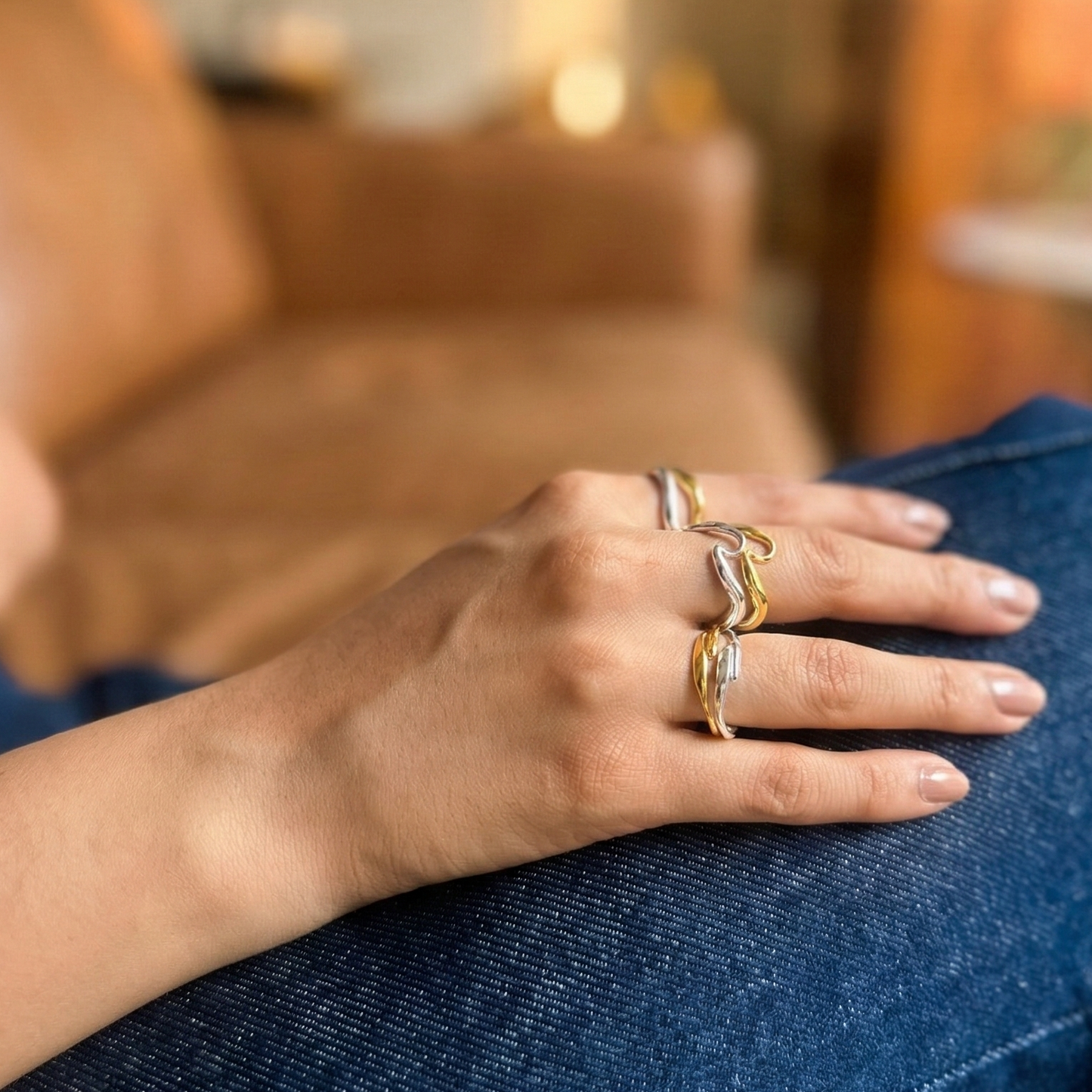 stacked gold and silver rings