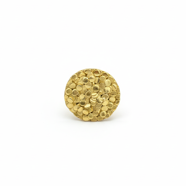 Gold ring on a white background
