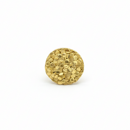 Gold ring on a white background