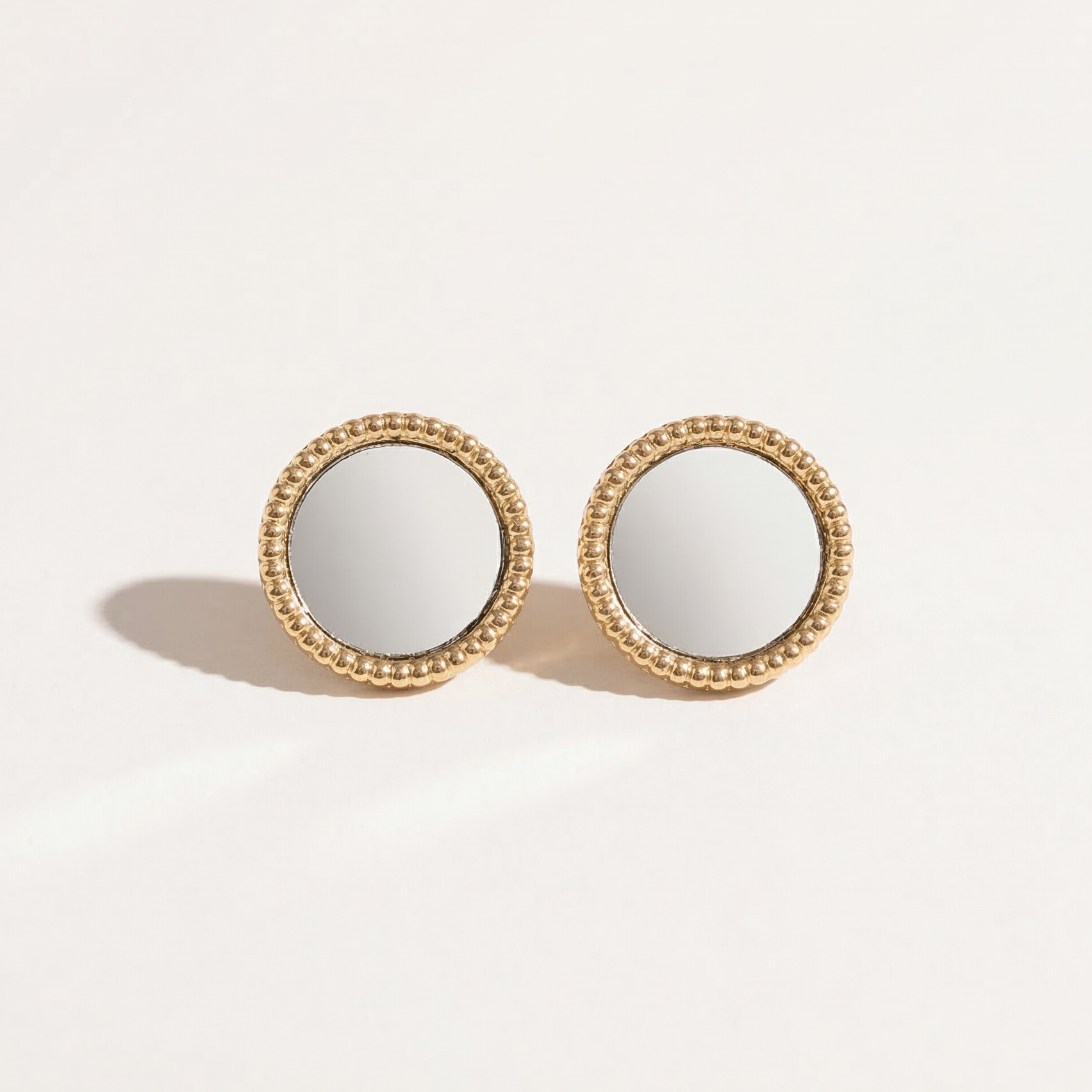 Gold studs with mirror effect silver plating
