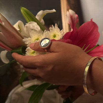 Person holding a bouquet of flowers with a blurred background