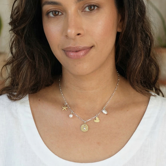 Silver and gold charm necklace