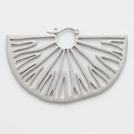 A silver-toned metal semi-circular earring with a cutout sunburst design, displayed on a clean white background.